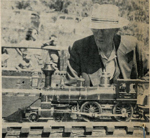 Walter Brown examines Bill Brower's old time loco.
