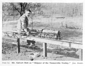 "Mr. Calvert Holt as 'Skipper of the Toonerville Trolley'". The Toonerville loco being driven by Calvert was built by a friend of his who had his own 3½" gauge track. Photo by George Bender, from "The Model Engineer". Thanks to John Baguley.