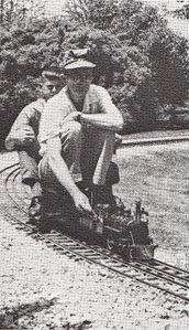 Bill Morewood's 3/4 inch scale RARITAN moves right along on the 3-1/2 inch gauge ground level track at Paoli with Paul Fitt as a passenger. Photo by William Fitt. From Live Steam Magazine, June 1969.