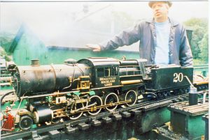Pat Fahey with "FireQueen", Bill Van Brocklin's 20th locomotive. Notice that it has been converted from Stevenson valve gear to Southern valve gear. This photo was taken at the Waushakum Live Steamers 21st Annual Meet at the Norfolk Street track site in Holliston, Massachusetts.