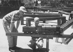 Art Craig and Carl Purinton with Art's 3/4 inch scale 'Massie' on the lift May, 1965.