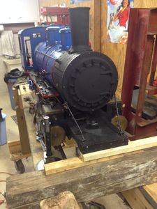 Number 486 temporarily "jacked up" on locomotive stand while repairs are underway.
