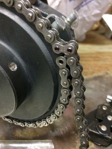 Place the chain on the two sprockets in order to measure the correct length. You will need to use either a Connecting Link or Offset Link, depending on which section of the chain must be removed. Use a black Sharpie marker to indicate which link pin to remove.