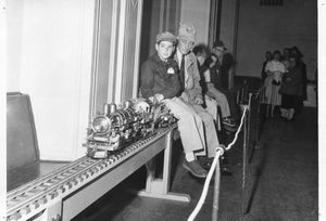 Ken Shattock operates a 3/4" scale Pacific on the GGLS portable track at the Model Engineering Show-May,1955. Photo provided by Ken Shattock.