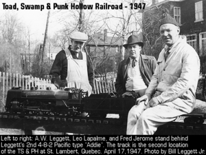 Bill (A.W.) Leggett Sr. stands behind his second 3/4" Pacific "Addie" built in 1938. To right is Leo Lapalme and Fred Jerome (on flat car). The photo was taken on April 17, 1947 by Bill Leggett Jr at the home track of the Leggett's Toad Swamp & Punk Hollow R.R. on Hickson Ave., St. Lambert, Que.