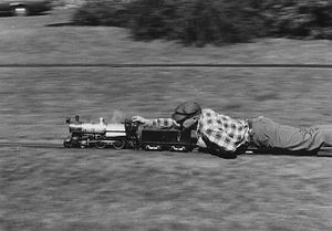 Charlie Purinton "ground flying" on his 3-1/2" gauge Boxford Outer Belt track. According to John Kurdzionak, the loco is a Delaware and Hudson style Wooten-fireboxed engine called "Skeevers". Its history is written about in the Charlie Purinton live steam history book. They tried several different ashpan configurations on it before they got it to steam well. Photo by Bob MacMillan.