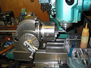 Overall view of indexing setup for cutting teeth on ratchet wheels.